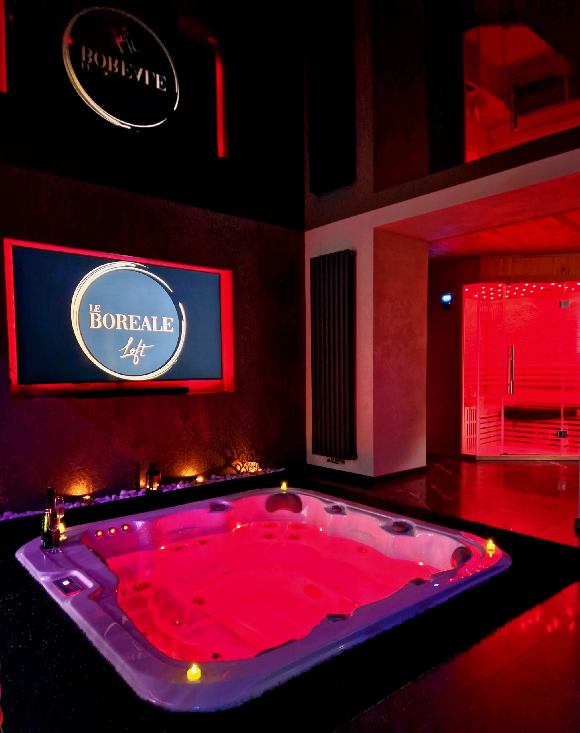 Jacuzzi relaxant, sauna apaisant et télévision pour une détente ultime Le boreal Love Room meurthe-et-moselle